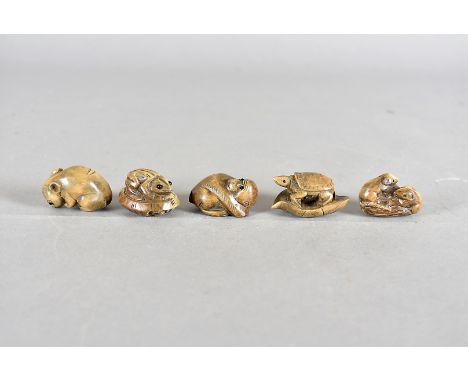A set of five Japanese Meiji period signed netsuke, the boxwood carvings all depicting animals of various forms, comprising a