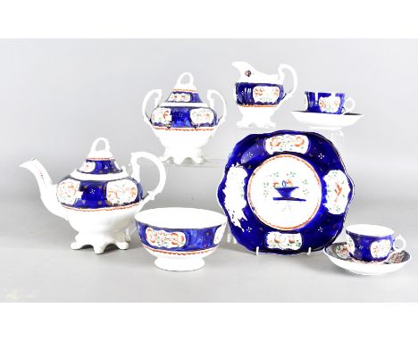 A 19th Century Gaudy Welsh tea service, comprising eleven cups some af, twelve saucers, two bread and butter plates, leaf bow