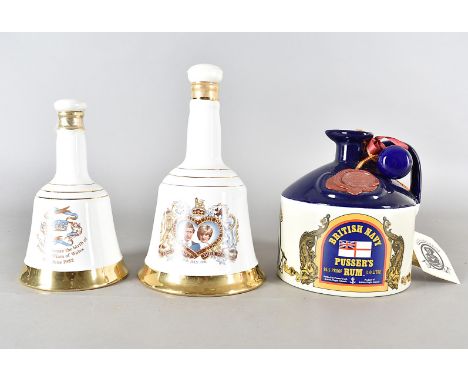 Jolly Jack Pusser' British Navy Pusser's Rum 95.5 proof 1.0 litre, together with two Wade Whisky bell shaped decanters (3)sea