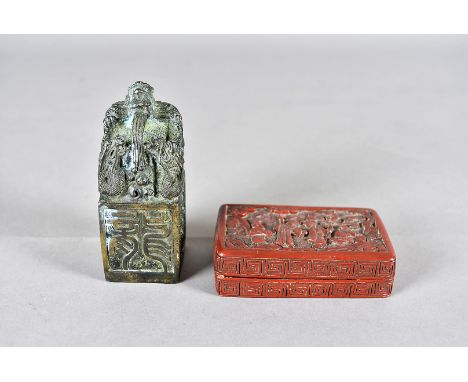 A 19th Century cinnabar Chinese box and cover, of rectangular form decorated with elders and students in garden, 10 cm x 6 cm