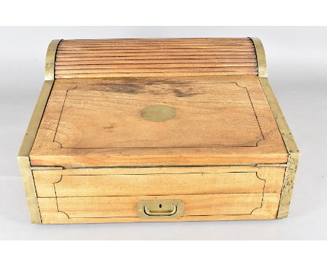 A 19th Century Campaign travelling writing slope, with tambour front, lift up fitted section, brass bound, green tooled leath