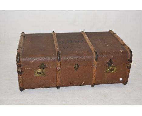 A vintage travel trunk, having four band, marked 'C.H.W Wraitislaw' to top