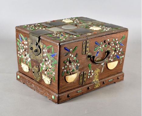 A 19th century Chinese hardwood and inlaid dressing table chest, brass bound exterior, the top inlaid with four early Chinese