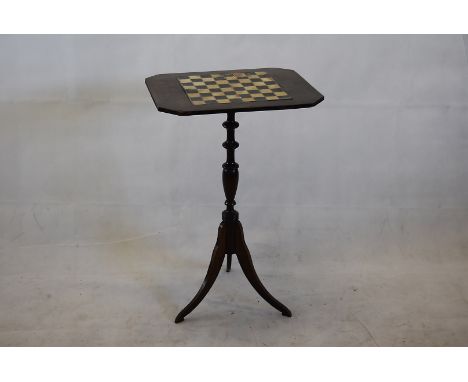 A vintage games table, having inlaid chequered board, on turned support, with tripod base, 74cm high, AF