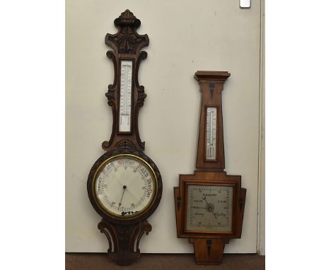 A vintage oak banjo barometer, having carved design to the body, together with a later Art Deco style inlaid example, AF (2)