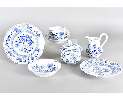 A Meissen Onion pattern six setting tea service, comprising cups and saucers, sandwich plates, milk jug and sugar bowl with c