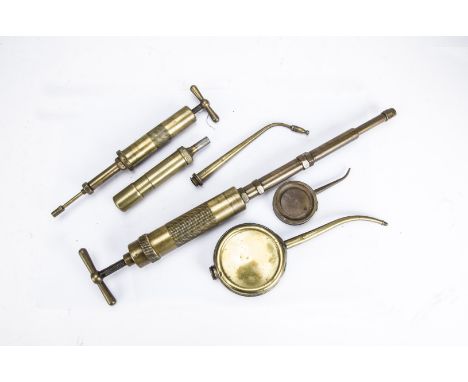 Motoring, a group of vintage grease guns and oilers inc, Enots Autoram Grease gun and swan neck examples.(5) 