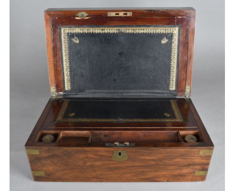 A walnut writing slope, with various pens together with an oak pipe cabinet (2)