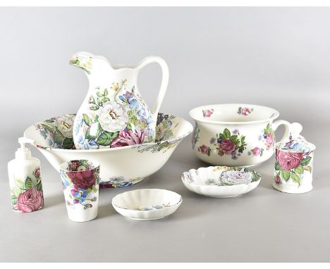 A modern pottery wash set, comprising large jug, basin, gazunder, soap dish decorated with transfer printed flowers and other