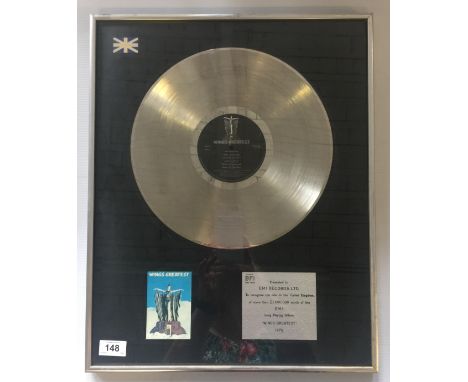 WINGS - certified BPI platinum award presented to EMI Records Ltd to recognise the sale in the United Kingdom of more than £1