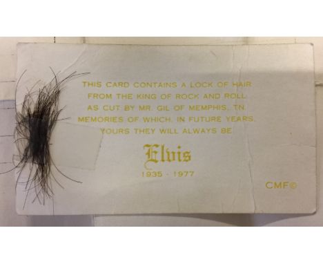 LOCK OF ELVIS PRESLEY'S HAIR - This rare and interesting item is a lock of Elvis Presley's hair cut by Homer M. Gilleland, kn