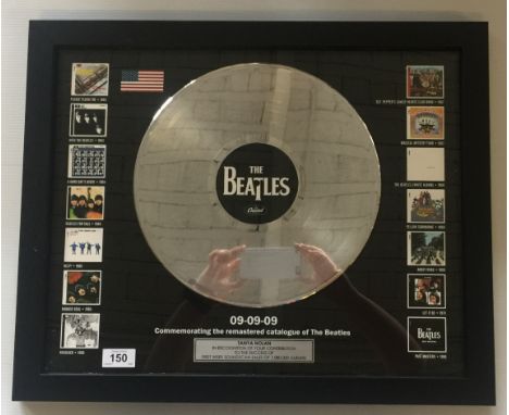 THE BEATLES - in-house EMI/Capitol award commemorating the Remastered Catalogue of The Beatles, presented to key members of t