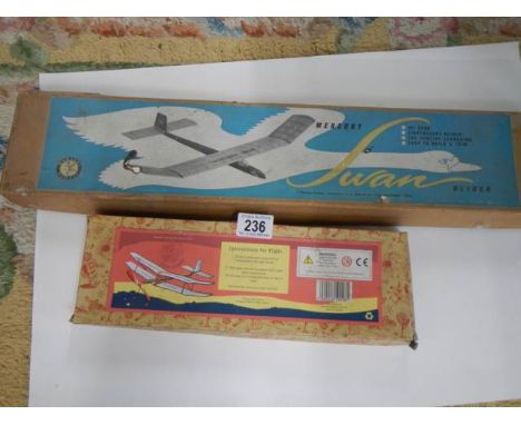 Two vintage model aircraft kits.