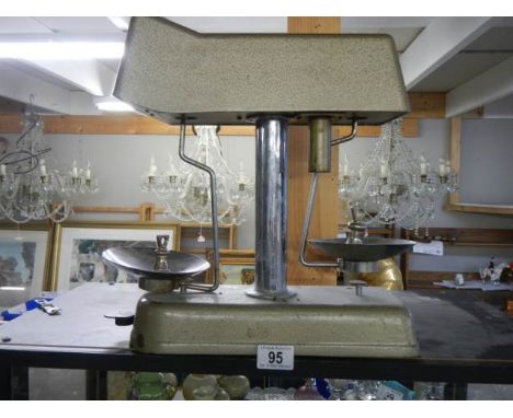 A set of vintage shop scales.