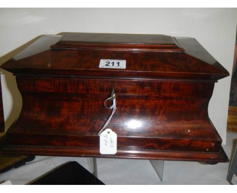 A 19th century mahogany tea caddy.