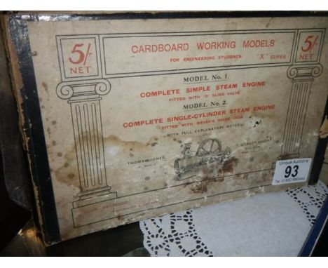 A vintage cardboard steam engine model.