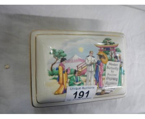 A porcelain item featuring Madame Butterfly.
