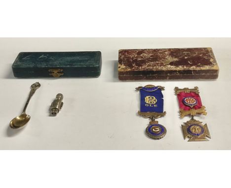 A silver novely baby's rattle as a Beefeater, Chester, 1959; a silver royal jubilee spoon, Mappin &amp; Webb, Sheffield 1934,