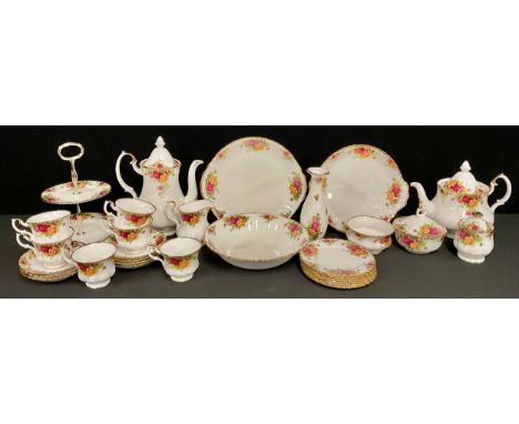 A Royal Albert Old Country Roses pattern teapot, coffee pot, sucrier and cover, milk jug, assorted cups and saucers; qty 