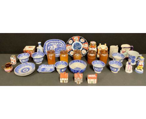 A Staffordshire Toby pepper pot, 13cm high, c.1860; a 19th century Staffordshire Imari ironstone vase, 15cm high; a Staffords