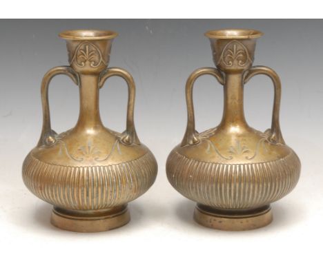 A pair of Grecian Revival patinated bronze mantel vases, cast in the Grand Tour taste after the antique as half-fluted amphor