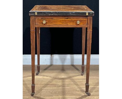 An Edwardian rosewood and marquetry envelope card table, hinged top enclosing a baize lined playing surface, above a long fri