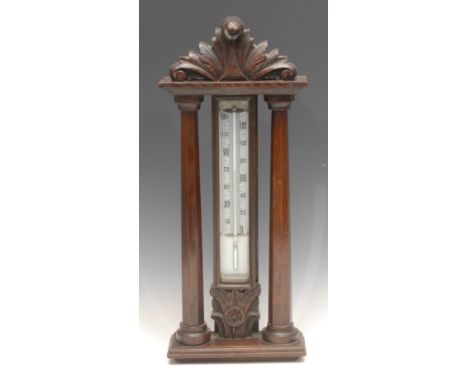 A Victorian oak wall mounted thermometer, Fahrenheit scale, mercury cistern, carved architectural case, 45cm high, c.1880 