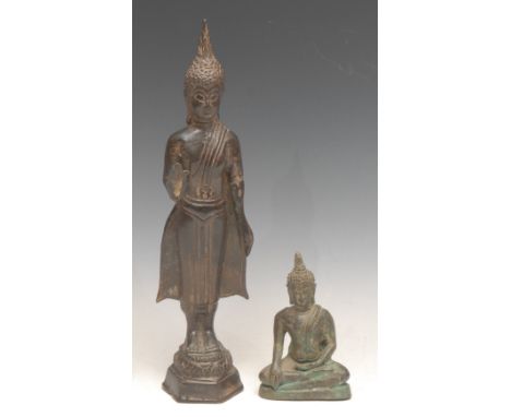 An Indonesian bronze deity; another taller (2) 