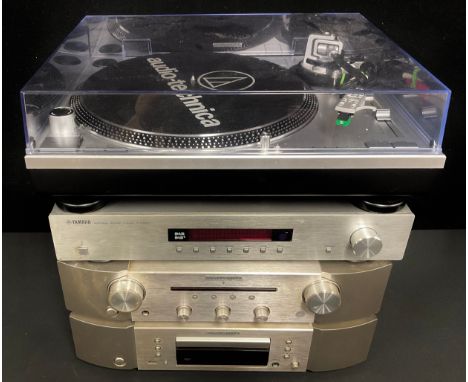 An Audio-technica AT-LP120-USB Direct Drive Professional Turntable; a Marantz Integrated Amplifier, PM6006; a Marantz CD Play