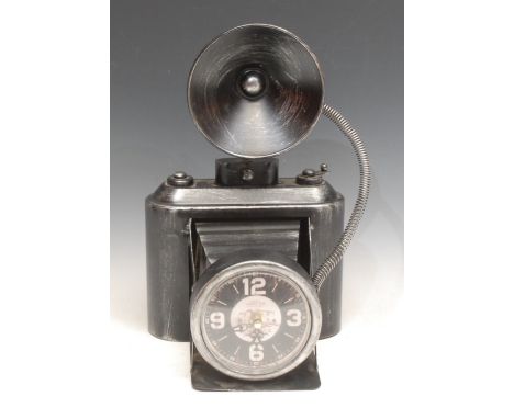 A 20th century French tin mantel clock, modelled as a folding camera, black dial, 31cm high 
