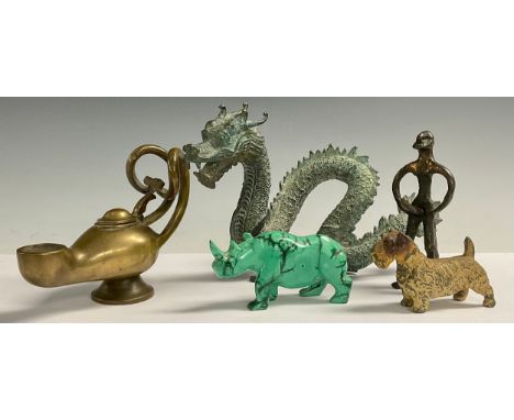 A bronze Roman style oil lamp, 17.5cm long; a Chinese verdigris bronzed cast metal model, of a dragon, 27cm long; a carved ma