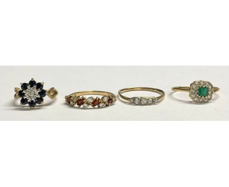 A 9ct gold dress ring, set with green and clear stones, size L, marked 375, 1.4g; an unmarked five stone diamond chip ring, s
