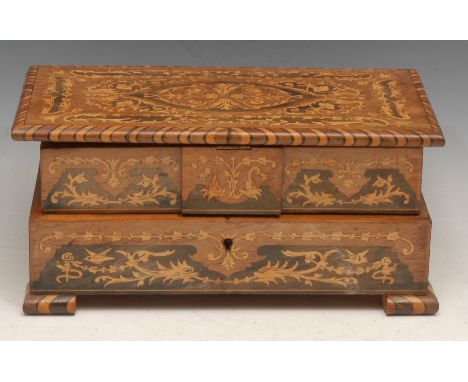 An Italian marquetry musical vanity case, the inlaid hinged cover revealing a cushioned interior, 11cm high, 24cm wide, 13.5c