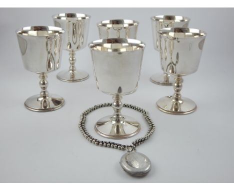 Victorian style oval white metal portrait locket on chain and a set of six later silver plated goblets. 