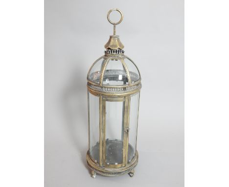 Large lantern light, cylindrical with a domed top and ring handle, with six glass panes and brass surround, 82cm h 