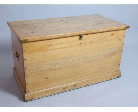 19th century pine trunk, the rectangular hinged top revealing a candle box and void interior, 95cm w 