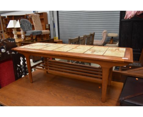A mid century tile top table having under rack, approx. 116 x 42cm
Condition report - the tiles seem in good order