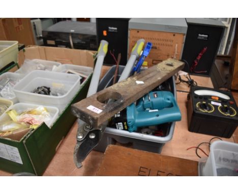 A selection of tools including Makita plasterboard driver