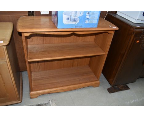 A modern medium stained set of shelves by Ercol, approx. D38cm W90cm H84cm, couple of paint marks else in excellent condition