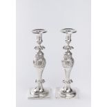 PAIRED CLASSICIST CANDLESTICS Before 1800 Silver 30,5 cm, 718.3 g A pair of Italian silver