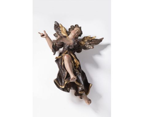 PAIR OF FLYING ANGELS First half of 18th century Germany Polychrome and gilded wood 60 cm A pair of flying baroque angels in 