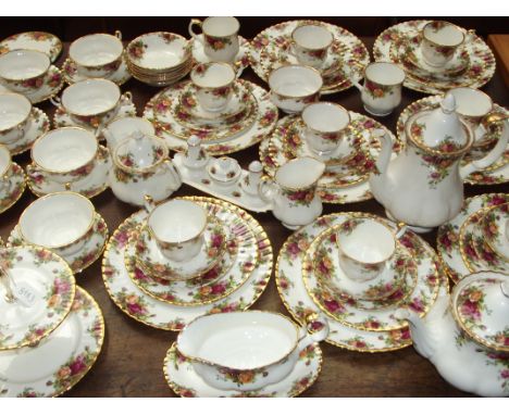 Royal Albert Old Country Rose over 80 pieces (3 teapots, cake stand, cruet set, gravy boat, milk jug, soup bowls and cups and