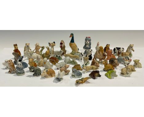 A collection of Wade Whimsies, including Disney characters, etc (approx. 50) 