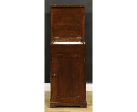 Maritime Furniture - an early 20th century oak ship’s cabin or campaign washstand, by Maple &amp; Co, stamped, hinged cover e
