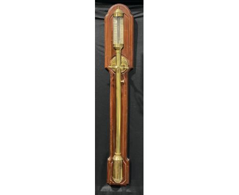 A Portuguese brass marine stick barometer, the silvered register calibrated in barometric inches with Vernier scale and inscr