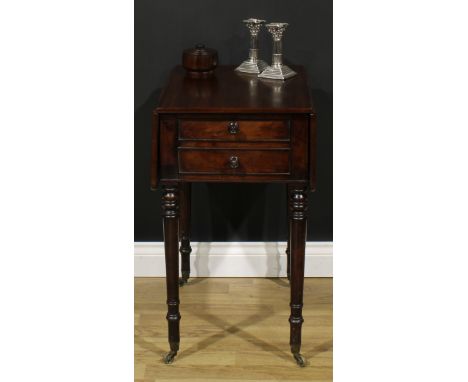 A George IV mahogany Pembroke occasional table, rounded rectangular top with fall leaves above a fall front door, blind to ve