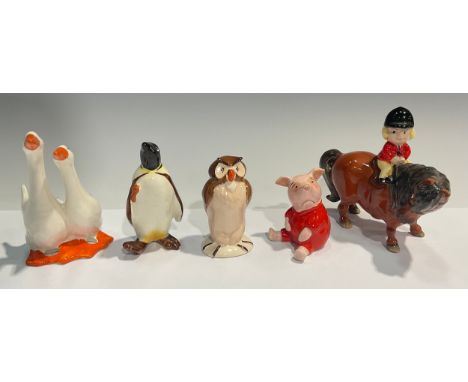 A Beswick Norman Thelwell model, Learner, 11cm high; a Beswick Walt Disney mocel, Piglet; another, Owl; a Penguin with cane; 