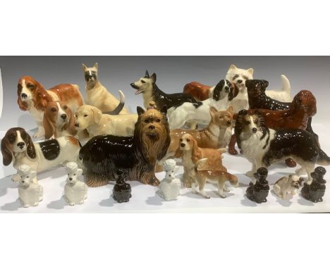 A Coopercraft ceramic model, of a West Highland Terrier, 18cm high; other Coopercraft dog models, including Yorkshire Terrier
