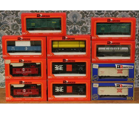 A collection of Rivarossi (Como, Italy) HO scale rolling stock, comprising 2206 Illinois Central flat car with load, window b