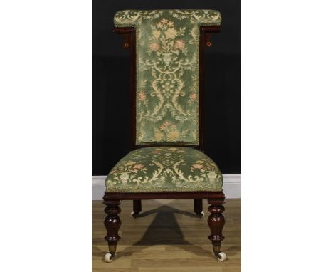 A Victorian mahogany prie-dieu chair, green floral upholstery, turned forelegs, ceramic casters, 95cm high, 49.5cm wide, the 